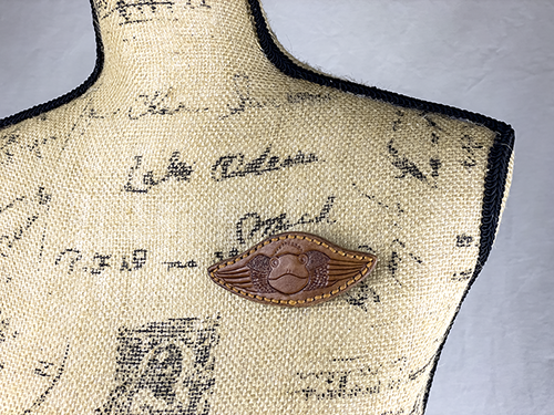 winged prince - sweater clasp