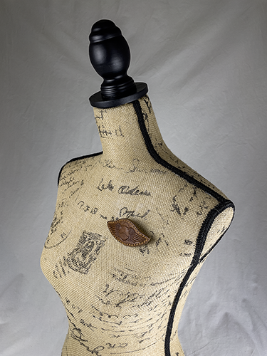 winged prince - sweater clasp