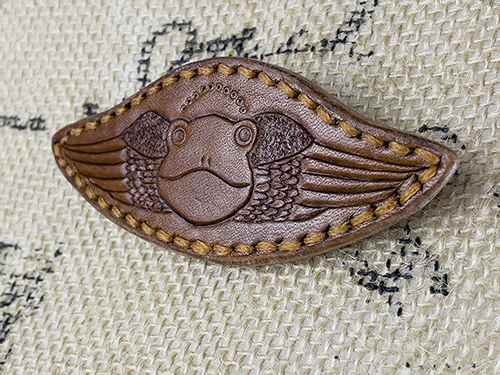 winged prince - sweater clasp